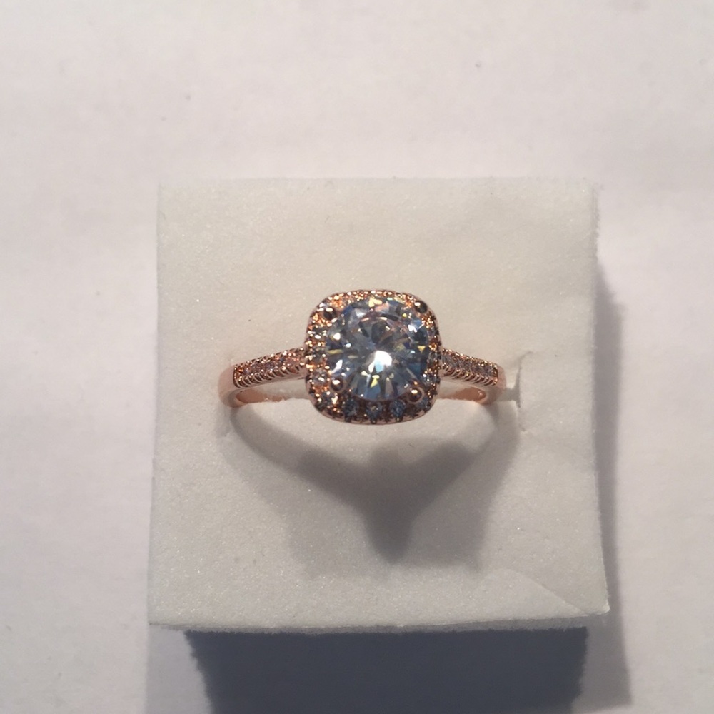 Rose gold plated, 1 carat topaz, CZ’s, size 10